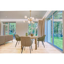 classic light vein cut travertine tile 12x24 honed filled installed to living room floor with green chairs