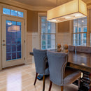 classic light vein cut travertine tile 12x24 polished installed to dining room floor closeup with blue chairs