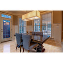 classic light vein cut travertine tile 12x24 polished installed to dining room floor closeup with blue chairs wide view