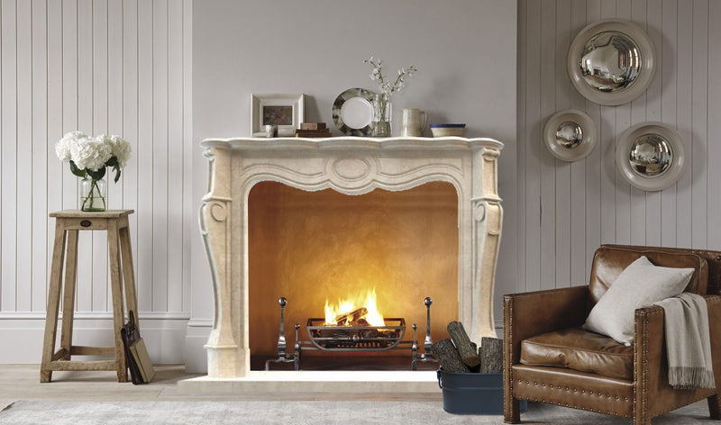 crema marfil marble fireplace mantel tarditional polished MEGFP01 installed on living room leather sofa