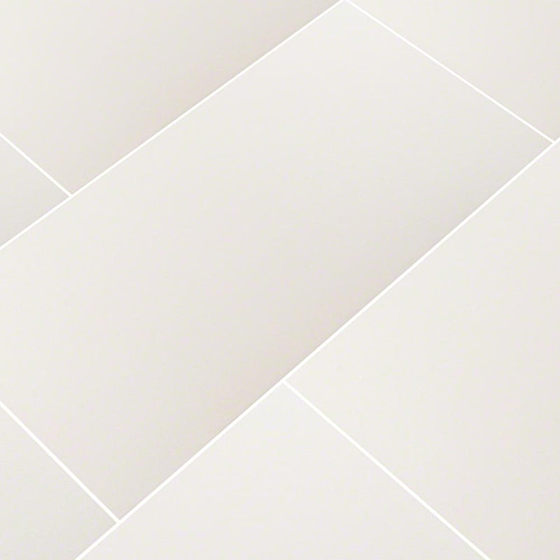 domino white polished porcelain floor and wall tile msi collection NWHI1224P product shot multiple tiles angle view