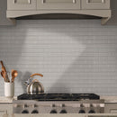 gray beveled glossy 11.89x11.97 porcelain  mosaic tile SMOT-PT-RETGRA-2X4BG msi collection room shot kitchen view 2