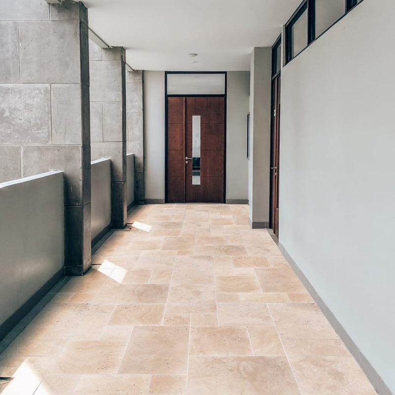 light beige premium travertine tiles antique pattern tumbled LBTPAPTUM installed to a hallway of an apartment floor