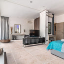 light onyx travertine tile 24x24 honed filled installed to a hotel room floor