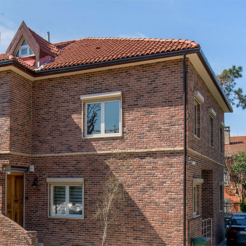 manufactured stone brick veneer barok antique red handmade B01AR 102243 installed facade house closeup