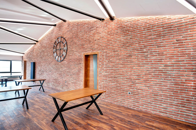 manufactured stone brick veneer ferrara red handmade B02RE 102263 installed on university classroom wall