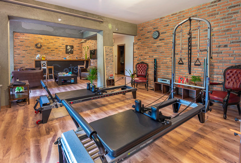 manufactured stone brick veneer granulbrick 50 red handmade B04RE 102285 installed on gyms wall red chairs