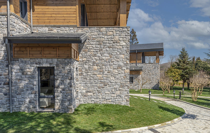 manufactured stone veneer ashlar pattern masso ash handmade S01AS 101195 installed facade exterior forest houses side