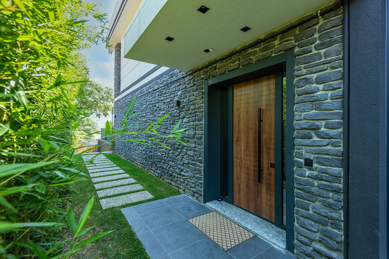 manufactured stone veneer slate look Cappadocia anthracite handmade S03TH 101208 installed facade house nice backyard