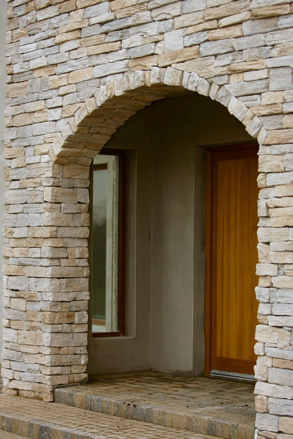 manufactured stone veneer slate look grand canyon pearl handmade S12PR 101245 installed entrance arch house wooden door wide