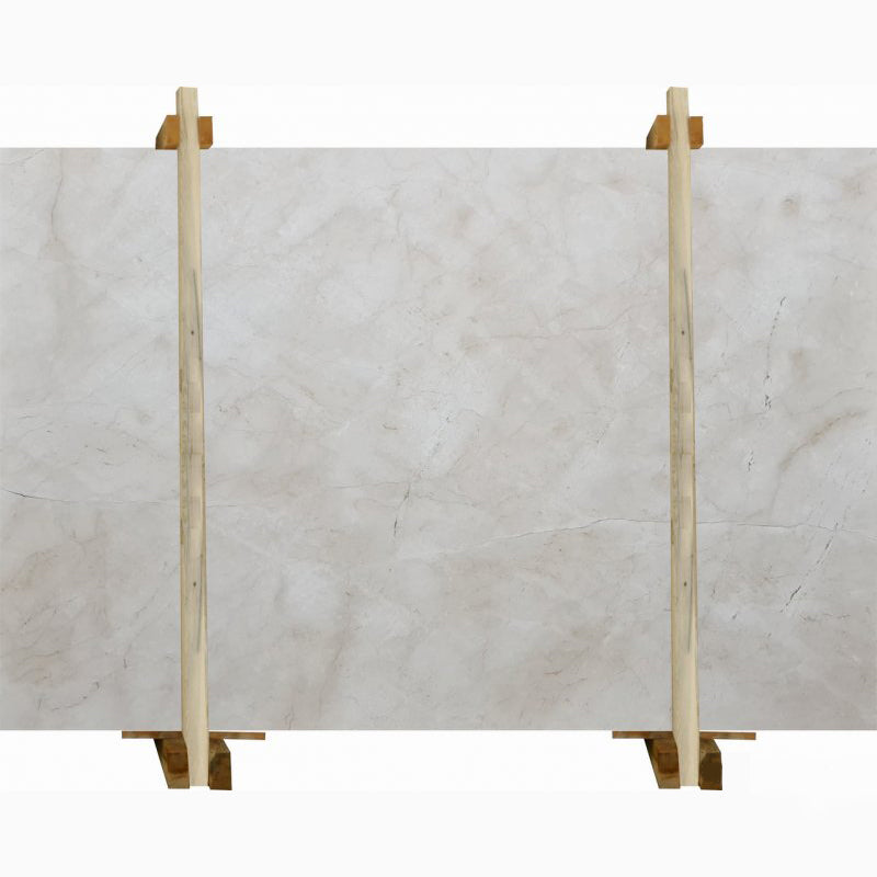 meyra beige marble slabs polished packed on wooden slabs front view