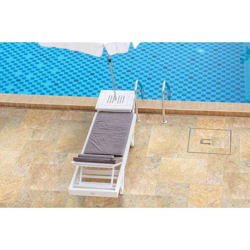 travertine pavers tuscany scabas pattern tumbled floor tile LPAVTSCA10KITS installed around pool with a white sun-bed