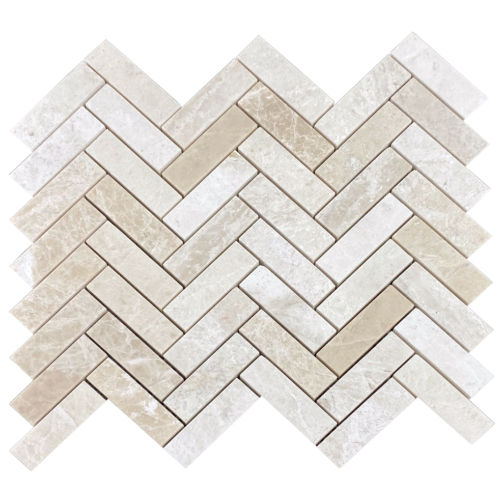 https://villohome.com/cdn/shop/products/vanilla-beige-marble-1x3-herringbone-honed-top-product-shot_1024x.jpg?v=1658239243